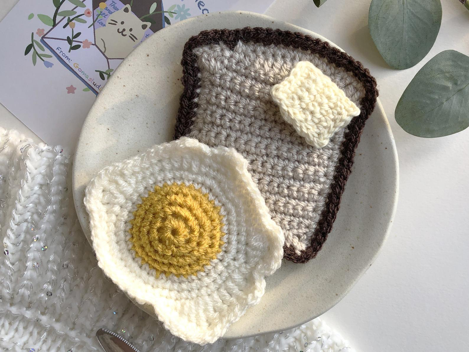 Crocheted breakfast food cat toys